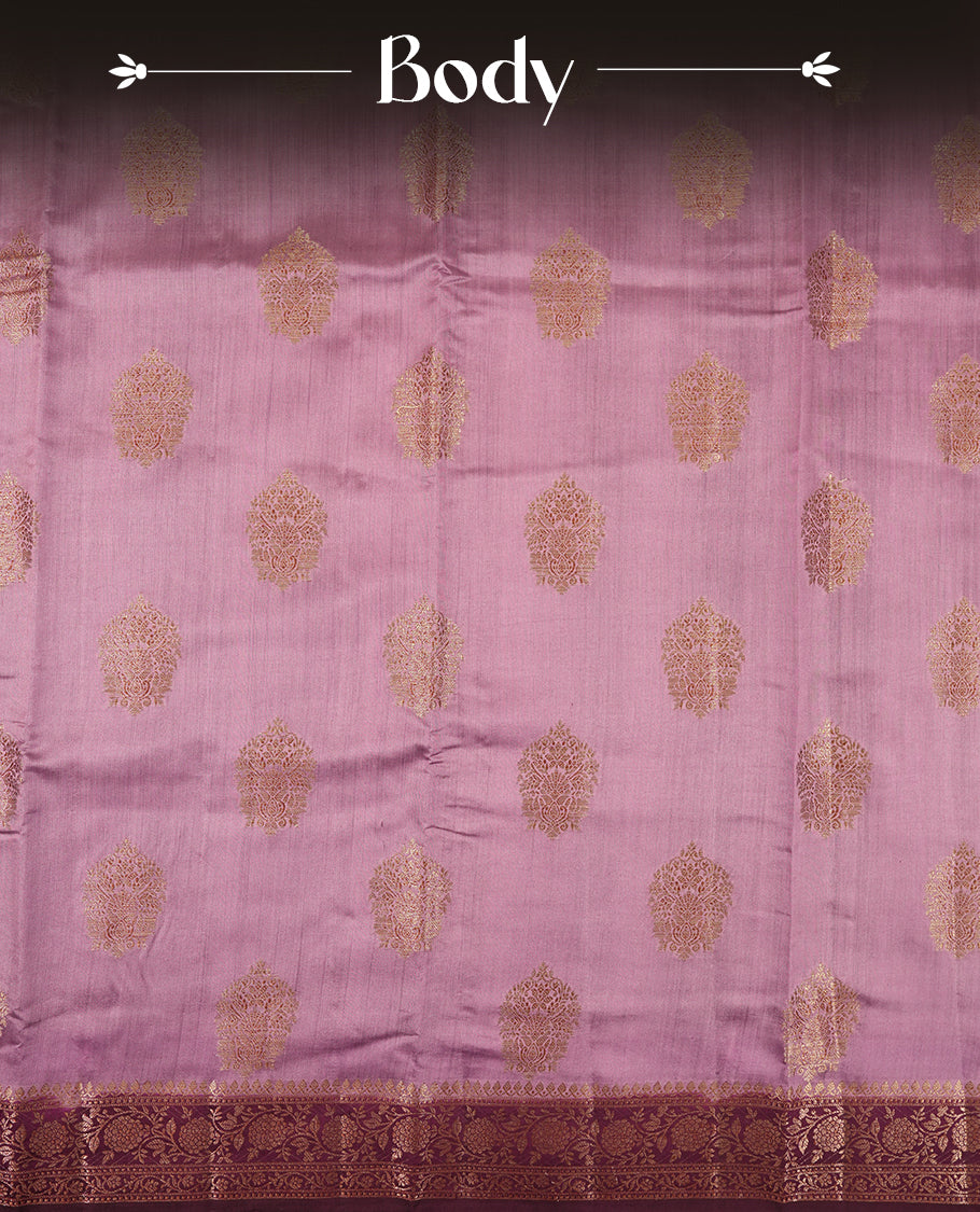 Pastel Pink Colour Banaras Soft Silk Saree with Gold Zari Textured Oval Buttas, Simple Decorative Pallu Border, Grand Pallu with Ornate Floral and Foliate Motifs in Deep Maroon and Gold Tones, and Matching Deep Maroon Blouse.