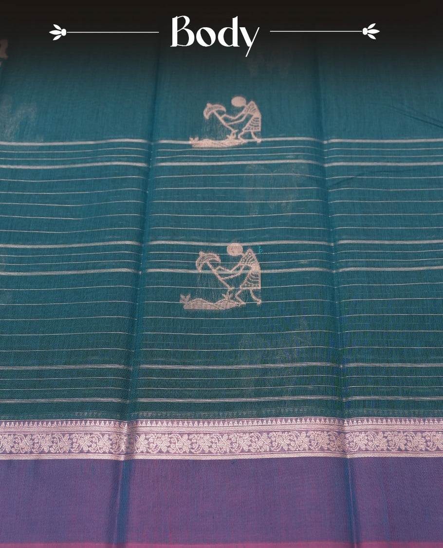Teal Green colour Silk Cotton Saree with Silver Warli Motifs and Fine Stripes on the Body, Contrasting Silver Zari Pallu Featuring Allover Geometric Pattern and Warli Procession Border, Finished with a Purple Selvedge and Coordinated Blouse Piece