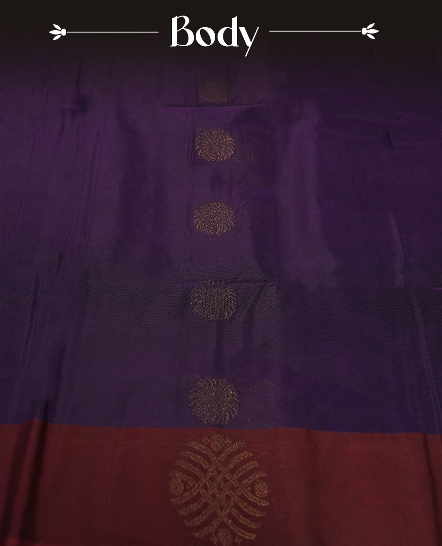 Purple colour soft silk cotton saree adorned with copper zari motifs and a shimmering copper zari border, Enhanced by a beautifully rich wine colour woven pallu & Comes with a matching blouse piece for a complete look.