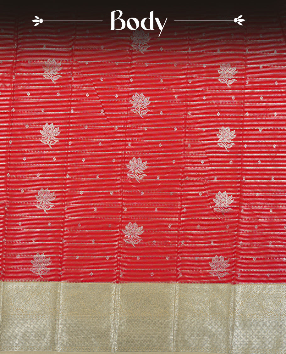 Red colour Semi Silk Saree with silver zari  patterns on the body, paired with a contrasting cream colour traditional pallu and border, and a matching blouse piece.