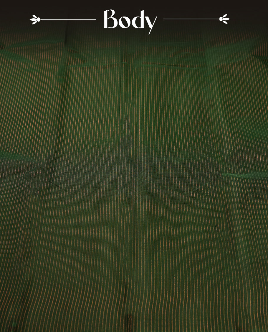Dark green colour silk cotton saree featuring with full of delicate vertical copper zari lines on the body & green contrasted colour pallu, Crafted without a border for a classy touch, Comes with a matching blouse for a perfectly coordinated look.