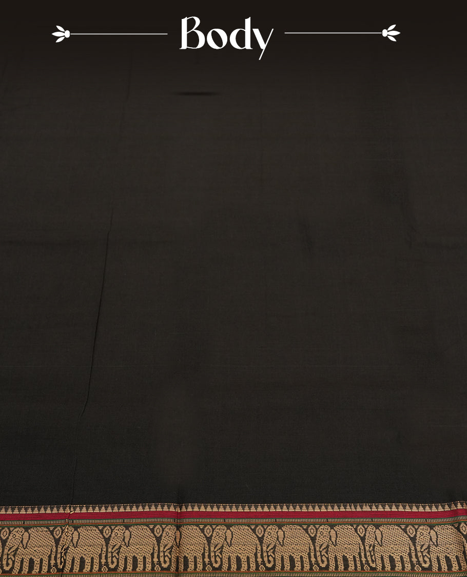 Black colour Narayanapattu cotton saree with a plain body and maroon borders featuring traditional golden elephant motifs & A timeless ethnic piece, this saree comes without a blouse piece.