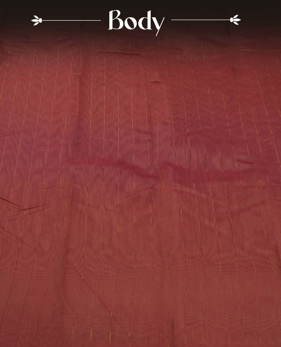 Dark onion colour silk cotton saree featuring with full of delicate vertical copper zari lines on the body & dark brown colour contrasted border, Crafted without a border for a classy touch, Comes with a matching blouse.