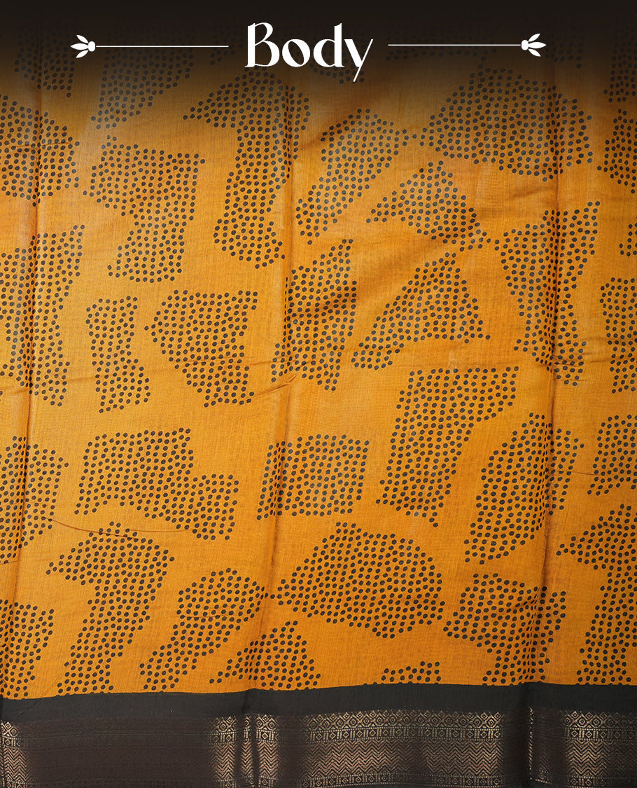 Mustard yellow colour chanderi cotton saree featuring black polka dot printed body,striped pallu with geometric patterns, golden zari border, and matching mustard yellow plain blouse.