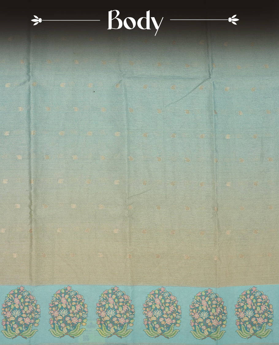 cream beige colour semi tussar saree adorned with gold zari motifs across the body and Floral pattern contrast Light blue colour on border, paired with a matching blouse.