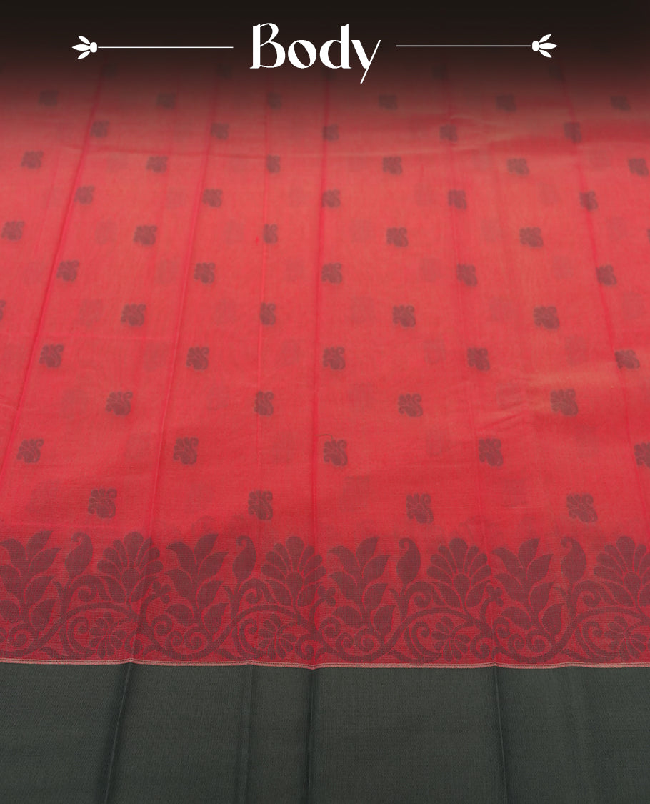 Crimson pink colour silk cotton saree featuring elegant floral zari motifs on the body, complemented by a rich contrast dark plain grey border and pallu with traditional woven detailing & Comes with a matching blouse piece.
