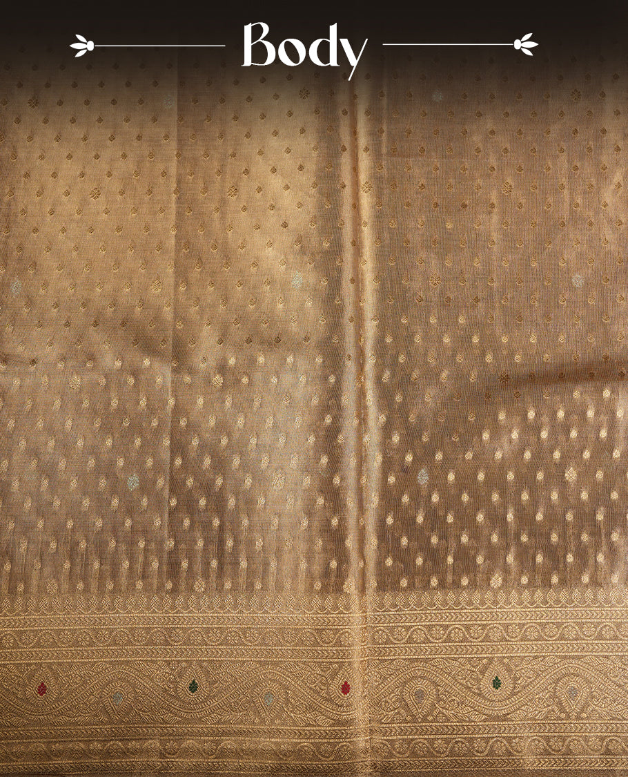 Light Gold colour tissue banaras silk saree featuring antique gold zari motifs on the body with rich traditional zari border and pallu, paired with a matching blouse piece.