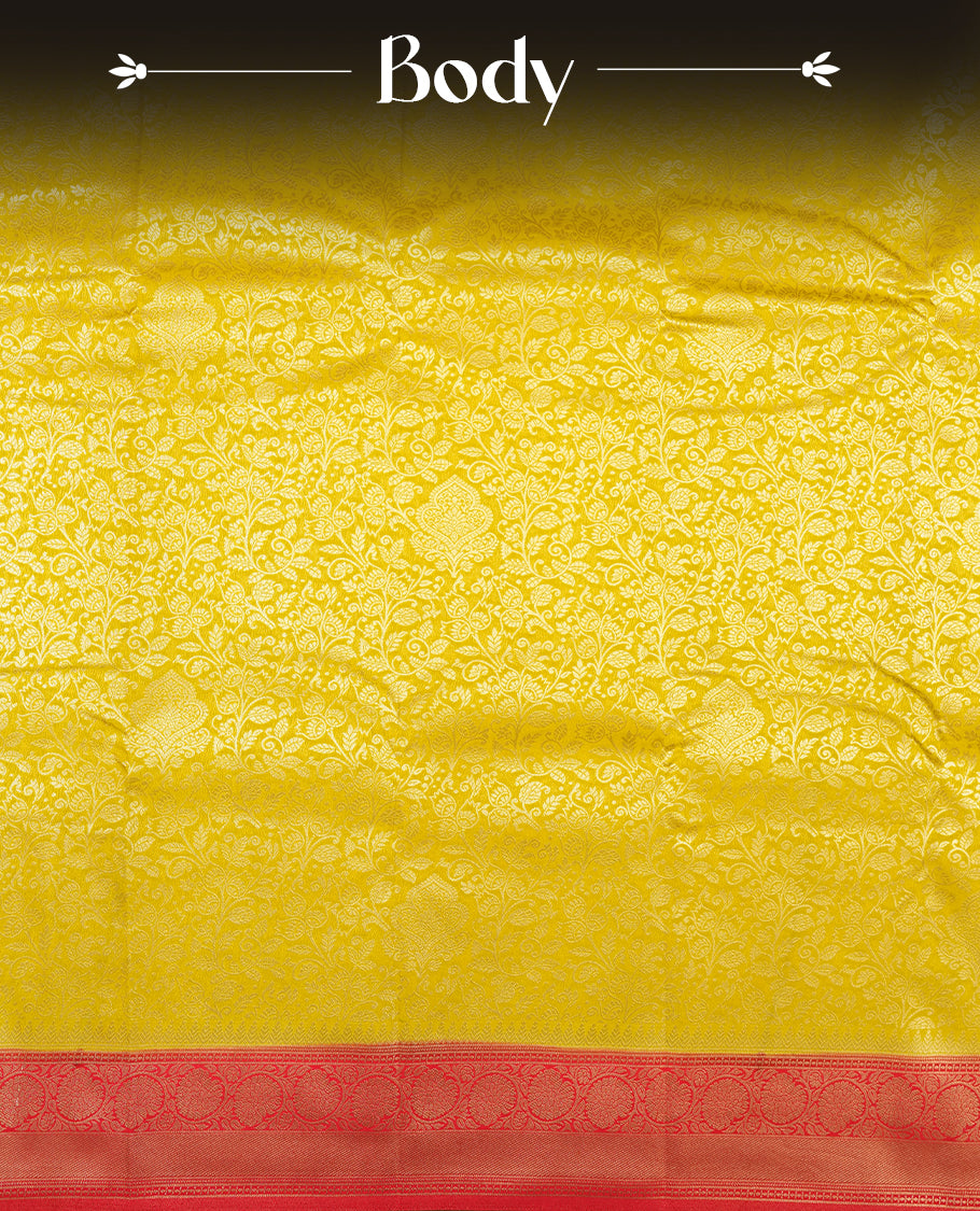 Lemon colour semi silk brocade saree featuring intricate Gold Floral kodi patterns across the body, complemented by a contrast rich red colour woven border and pallu, paired with a matching blouse.