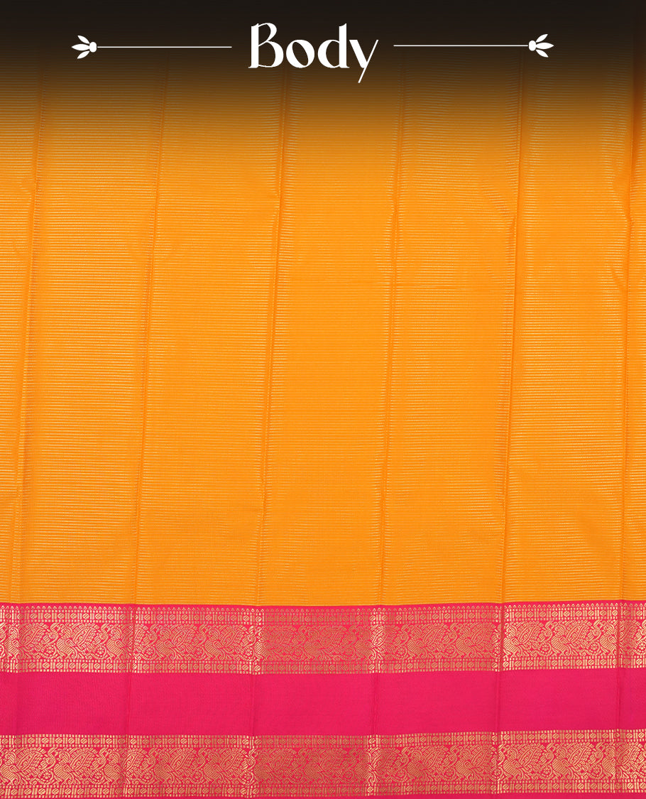 Harvest gold colour Semi Silk Saree with gold zari striped patterns on the body, paired with a contrasting rani pink colour traditional pallu and border, and a matching blouse piece.