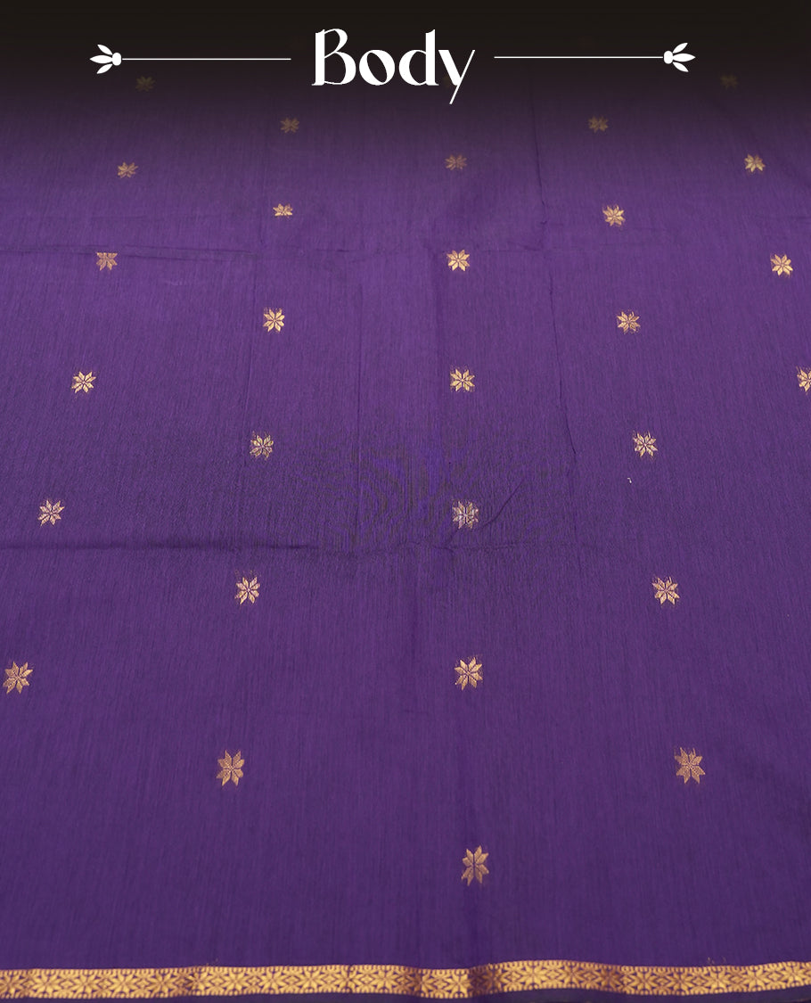 Teal Blue Colour silk cotton saree featuring small zari buttas on the body, contrast purple section, zari pallu, and matching blouse with border detailing.