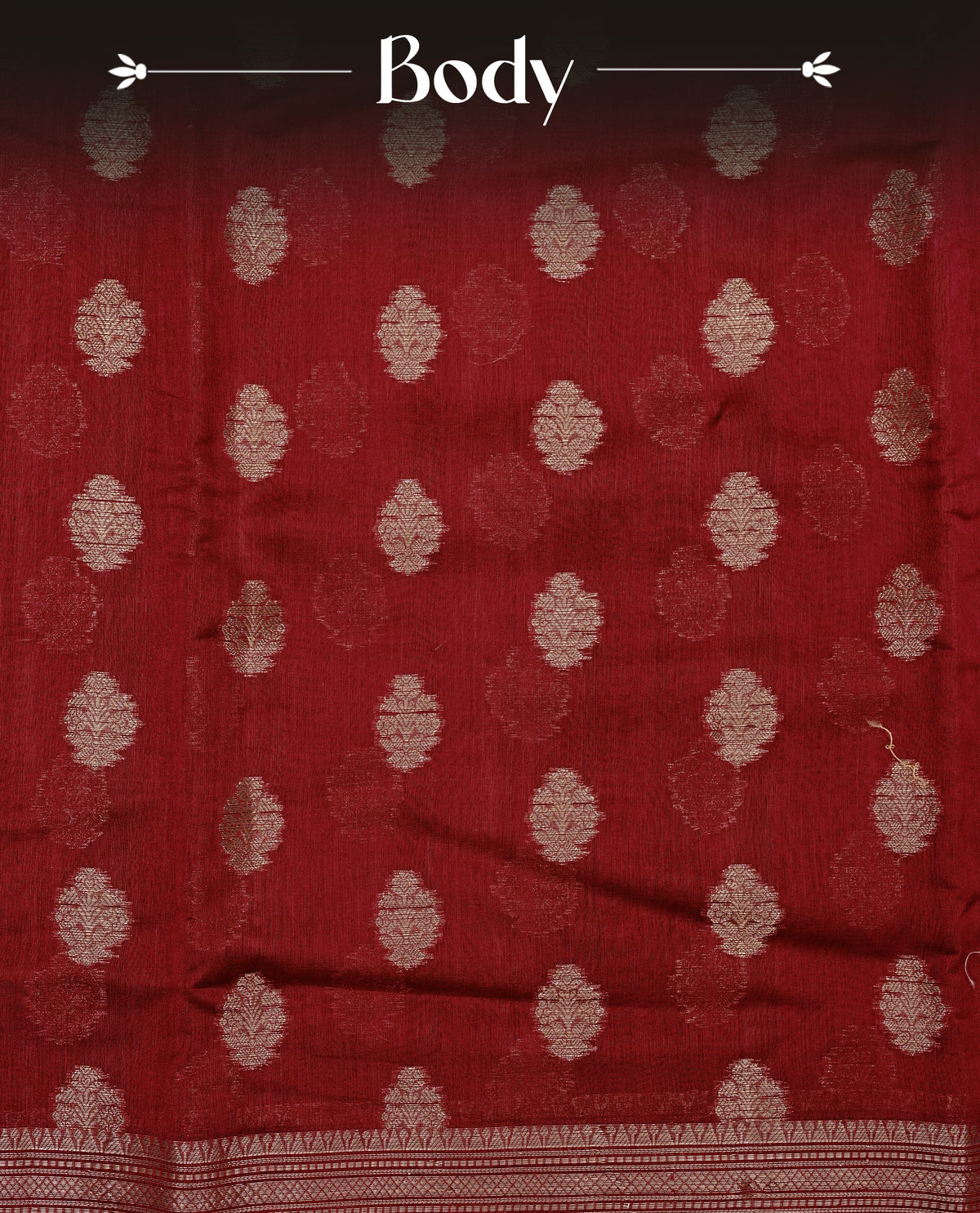 Maroon colour Banaras silk saree featuring gold zari buttas on body, complemented by self colour with zari border, comes with matching blouse piece.