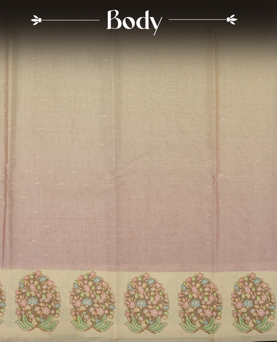 Rose gold colour semi tussar saree adorned with gold zari motifs across the body and Floral pattern contrast cream colour on border, paired with a matching blouse.