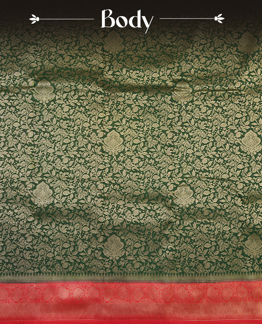 Dark green colour semi silk brocade saree featuring intricate Gold floral kodi patterns across the body, complemented by a contrast rich red colour woven border and pallu, paired with a matching blouse.