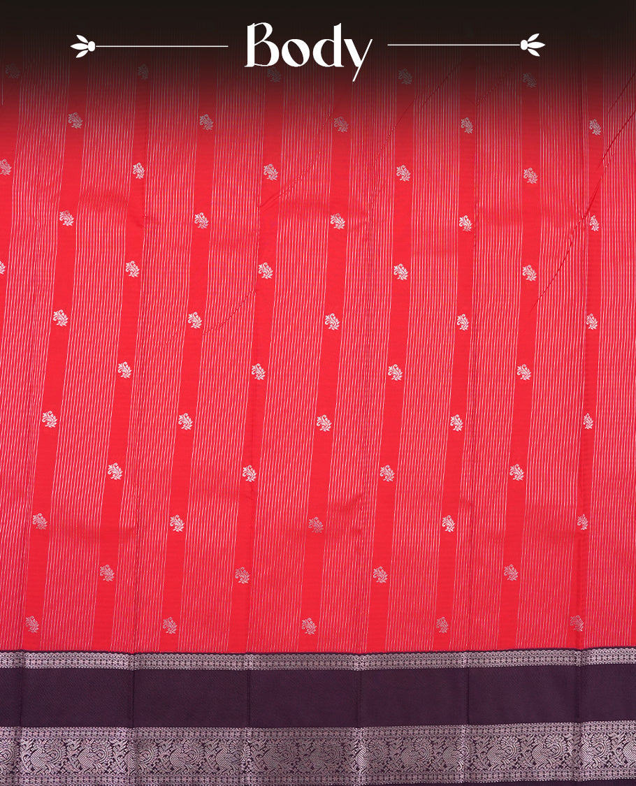 Red colour Semi Silk Saree with rose gold zari patterns on the body, paired with a contrasting Dark violet colour traditional pallu and border, and a matching blouse piece.