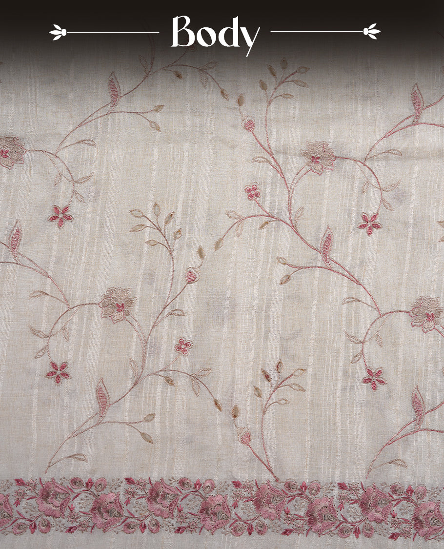 Cream colour semi tusser silk saree featuring with Pink colour thread embroidery kodi pattern all over body, pallu, border  and paired with matching blouse piece.