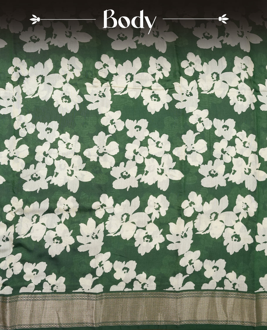 Green colour Viscos semi printed saree featuring a light golden zari border, abstract white printed motifs on the body, and comes with a matching blouse