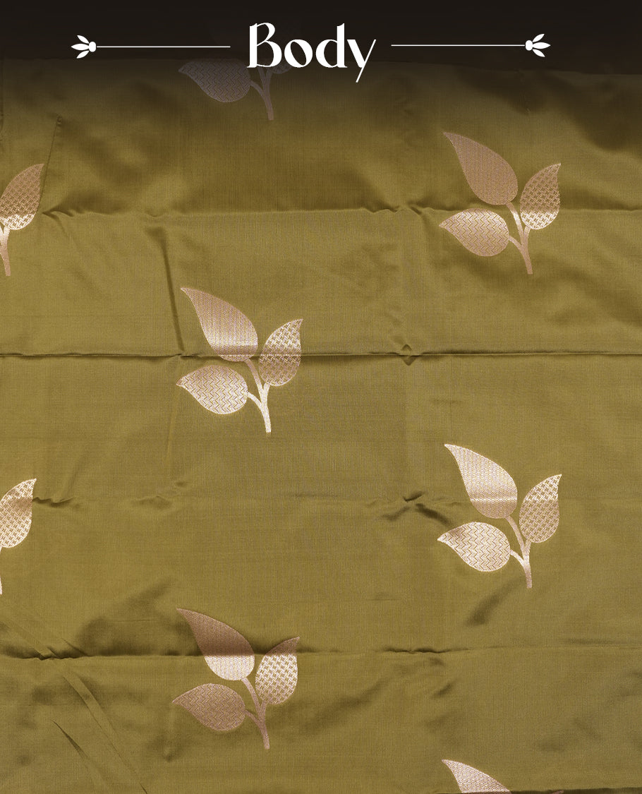 Olive Green colour Semi Silk Saree with Rose Gold Satin-Finish Pallu Featuring Bold Leaf Motifs, Geometric Zari Edging and Tassels, Paired with Coordinated Blouse Piece