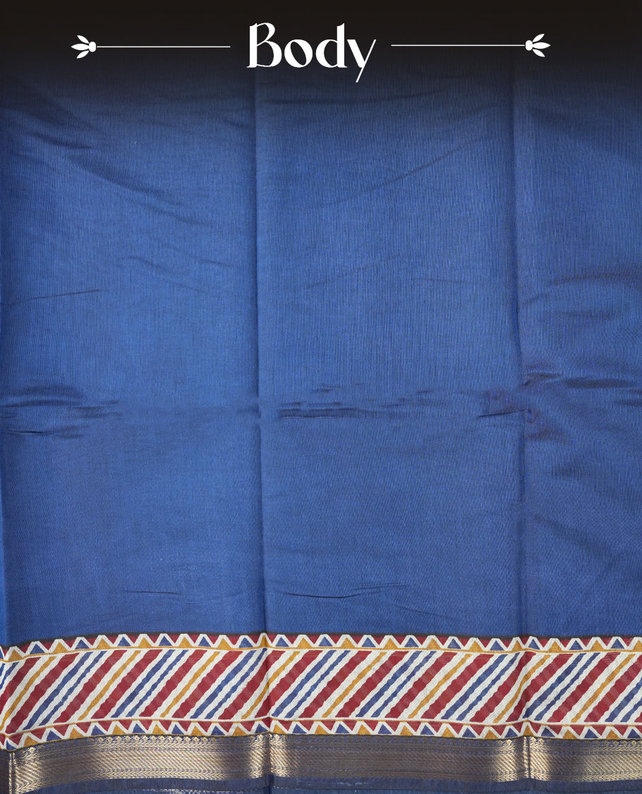 Royal blue colour chanderi cotton saree with plain body, geometric tribal printed pallu with golden zari border, and matching striped blouse.