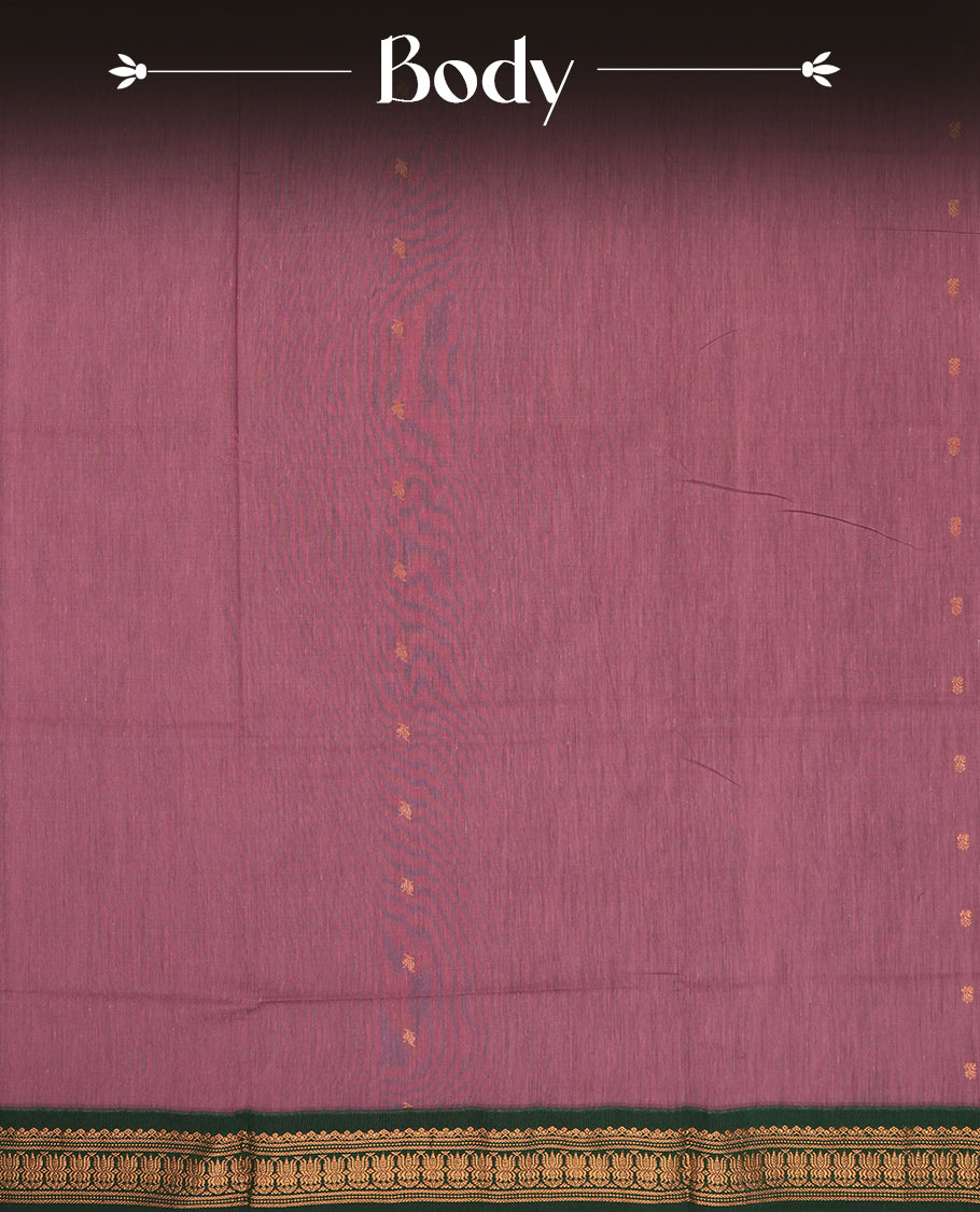 Lavender colour Kalyani Cotton saree with deep green border and pallu, adorned with copper zari lotus motifs and intricate weaving & Comes with a matching blouse piece.