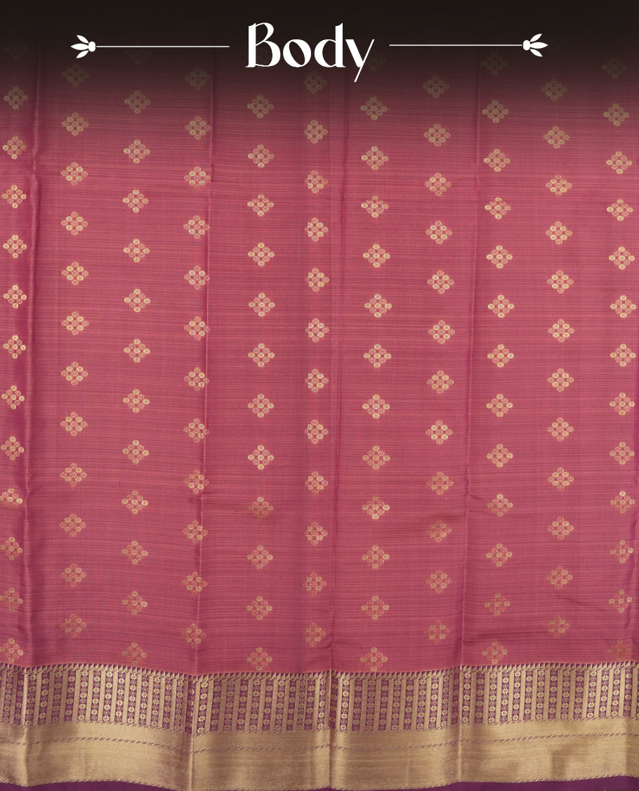 Twilight lavender colour semi soft silk saree featuring a golden textured patterned body, complemented by contrast purple with golden motifes on pallu & border and a matching blouse piece.