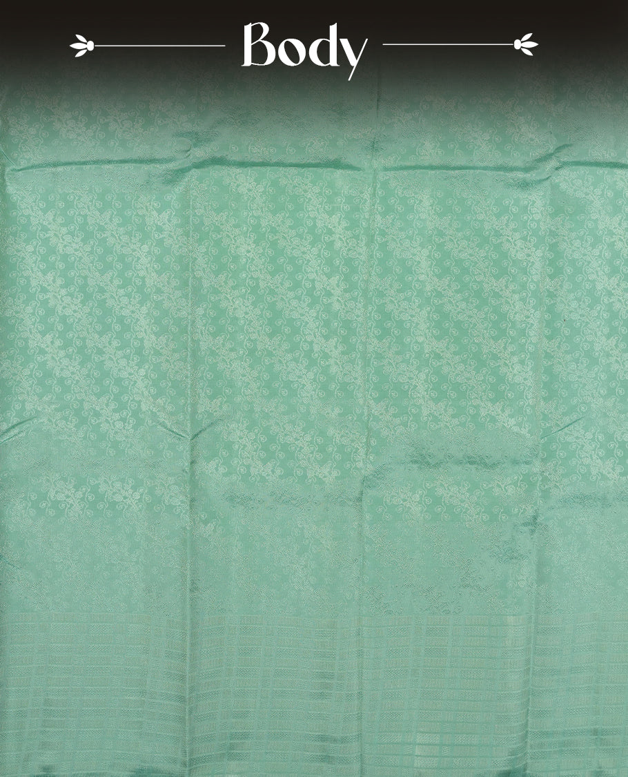 Pastel aqua blue colour semi soft silk saree featuring a self coloured textured patterned body, complemented by self coloured box motifes on pallu & border and a matching blouse piece.