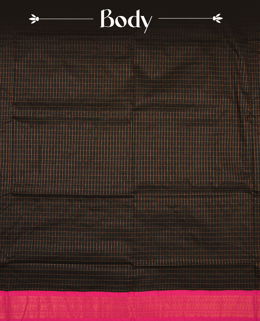 Black coloured mixed Kalyani cotton saree featuring copper zari checks on the body, complemented by a dark magenta coloured border and pallu adorned with copper zari patterns, Paired with a matching blouse.