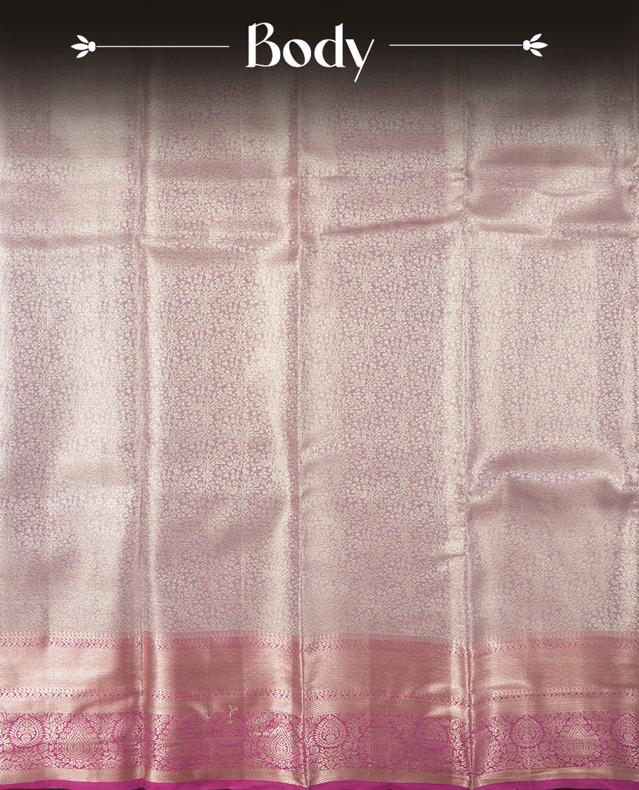 Light lavender colour and silver Zari Tissue Brocade Saree features intricate floral Motifs on body and dark pink colour contrast with traditional border & pallu, paired with matching blouse