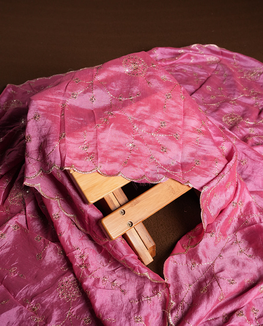 White colour churidhar material featuring thread embroidery on the front panel, contrast Pink colour dupatta with elegant border, and matching plain bottom