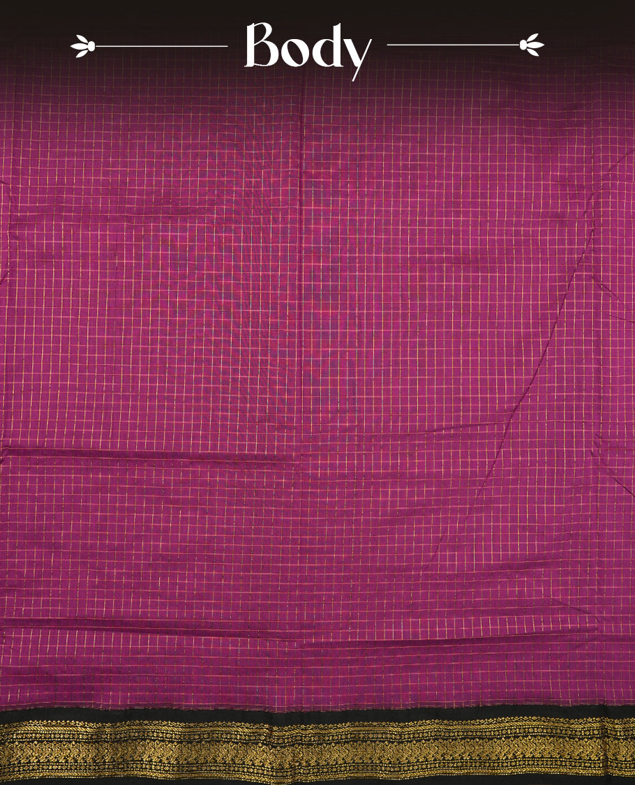 Grape coloured mixed Kalyani cotton saree featuring golden zari checks on the body, complemented by a black coloured border and pallu adorned with golden zari patterns, Paired with a matching blouse.