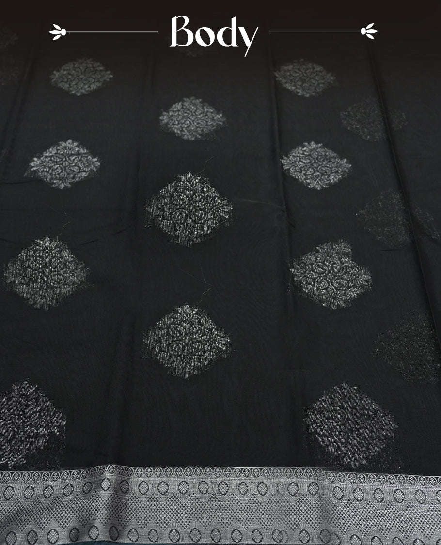 Black Cotton Saree with Silver Zari Textured Circular/Medallion Butta Body, Featuring Elaborate Zari-Woven Pallu with Multi-Layered Ornamental Border Patterns and Fine Geometric Details, Paired with Matching Gray Woven Textured Plain Blouse Piece