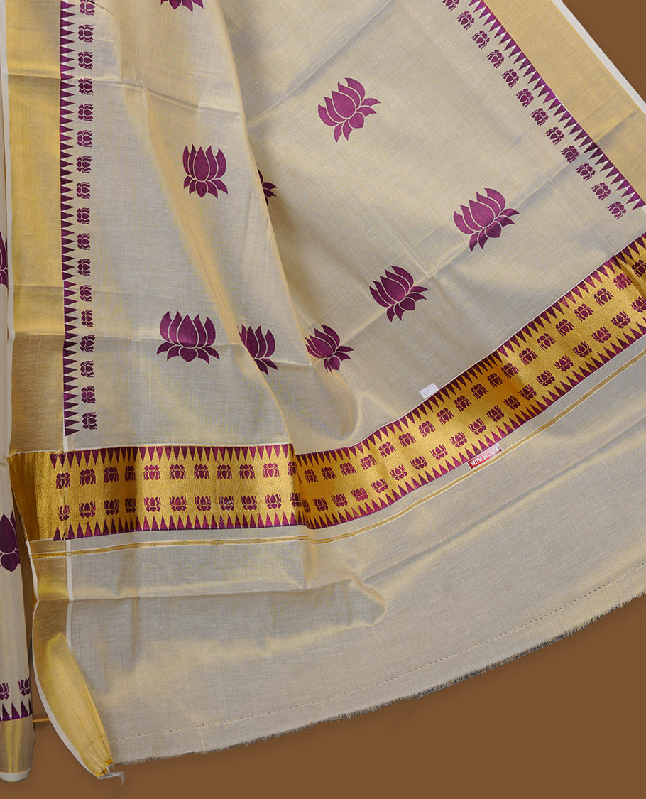 Off-white colour Tissue Kerala saree featuring elegant purple lotus motifs across the body, highlighted with a classic gold kasavu border and matching woven pallu, paired with a coordinating blouse.