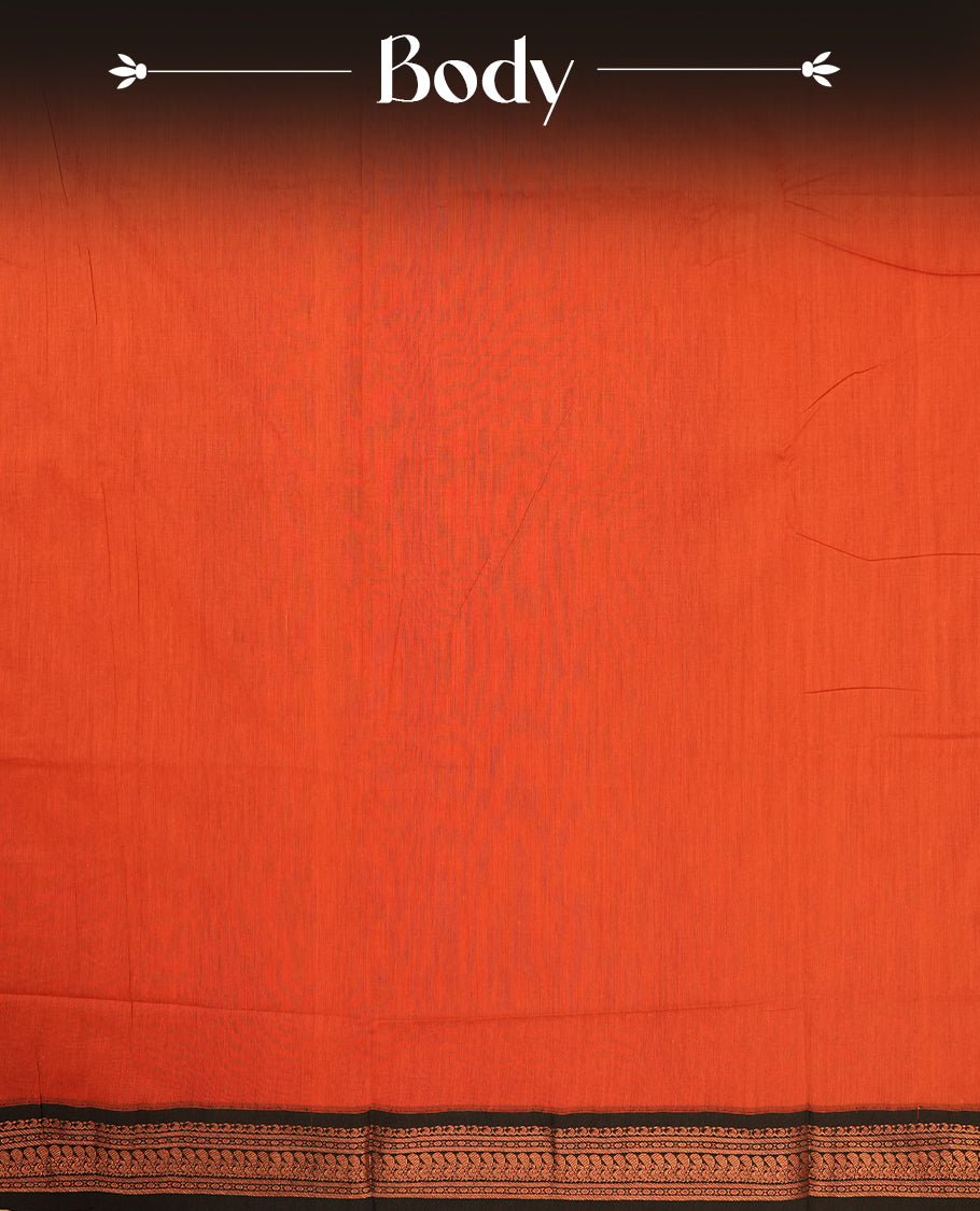Orange colour Kalyani Cotton saree with rich black colour border with peacock motifs on  pallu, featuring copper zari and intricate weaving & Includes a matching blouse piece.