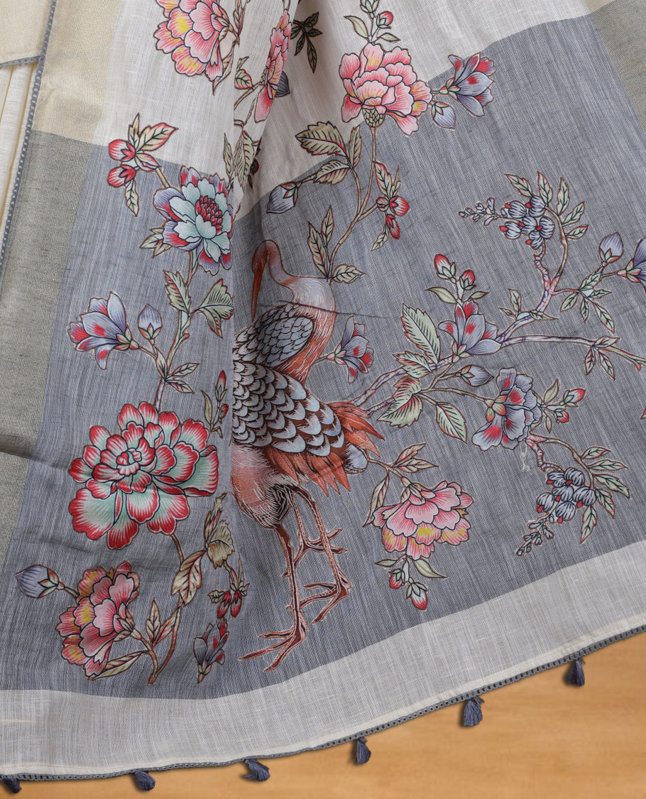 Cream colour cotton linen silk saree featuring Floral  & brids printed pattern on body, golden simple border with gray colour pallu and comes with a matching blouse