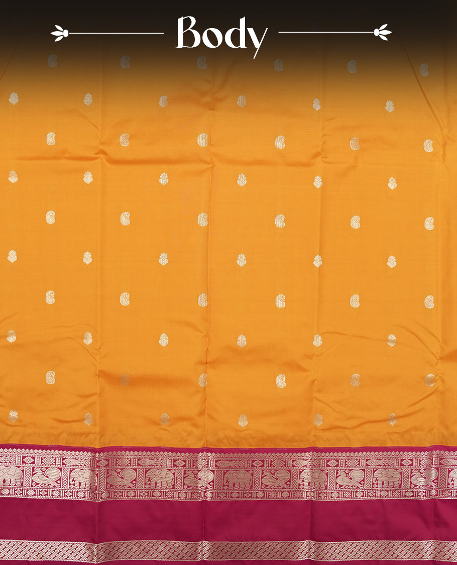 Mustard yellow colour semi soft silk saree featuring a gold coloured textured patterned body, complemented by contrast maroon golden traditional motifes on pallu & border and a matching blouse piece.
