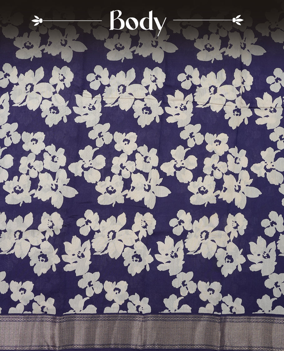 Navy blue colour Viscos semi printed saree featuring a light golden zari border, abstract Off white printed motifs on the body, and comes with a matching blouse