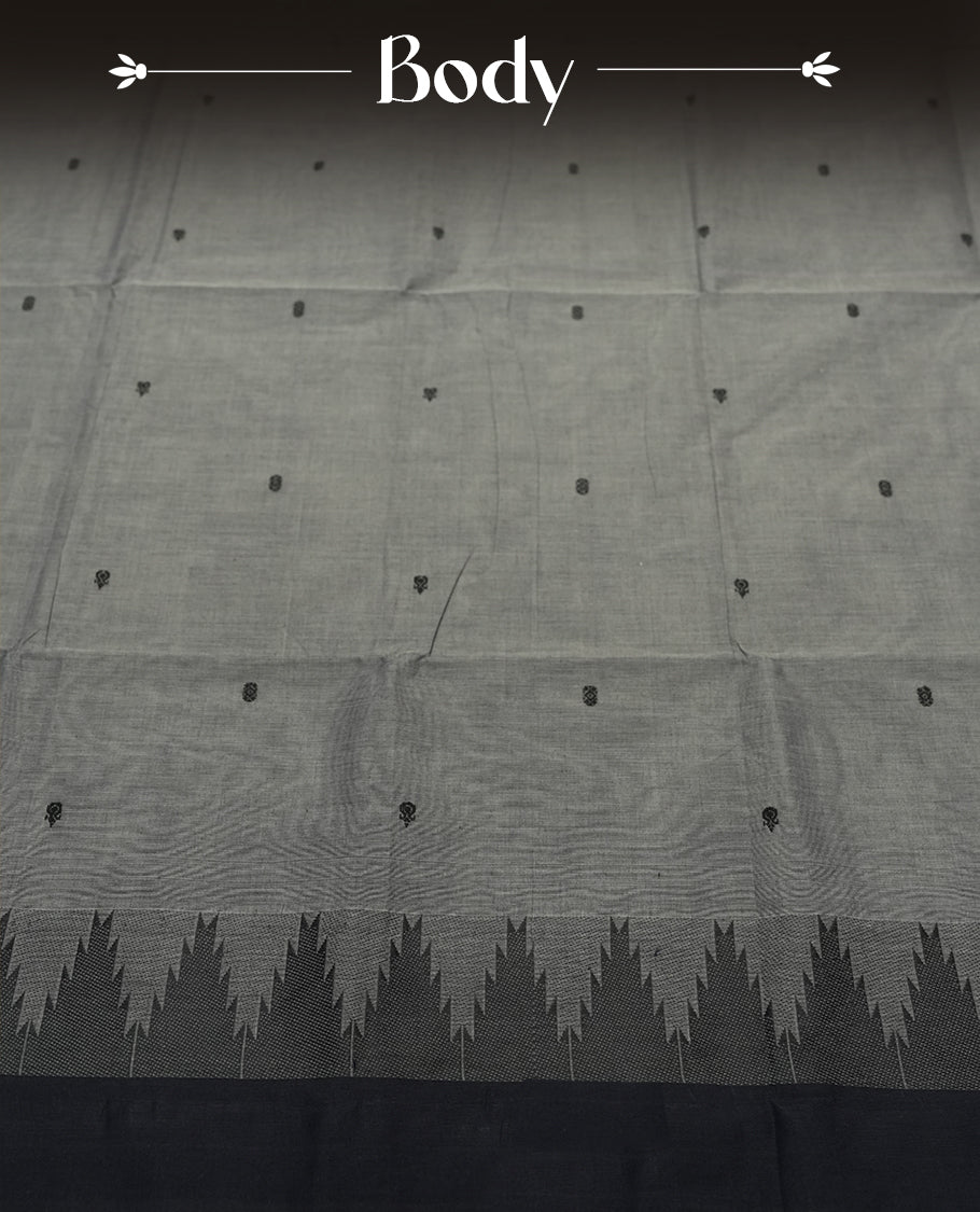 Grey Silk Cotton Saree with Black Floral Buttas Body, Accented by Zari Striped Border on Black and Grey Pallu, Paired with Matching Blouse Piece