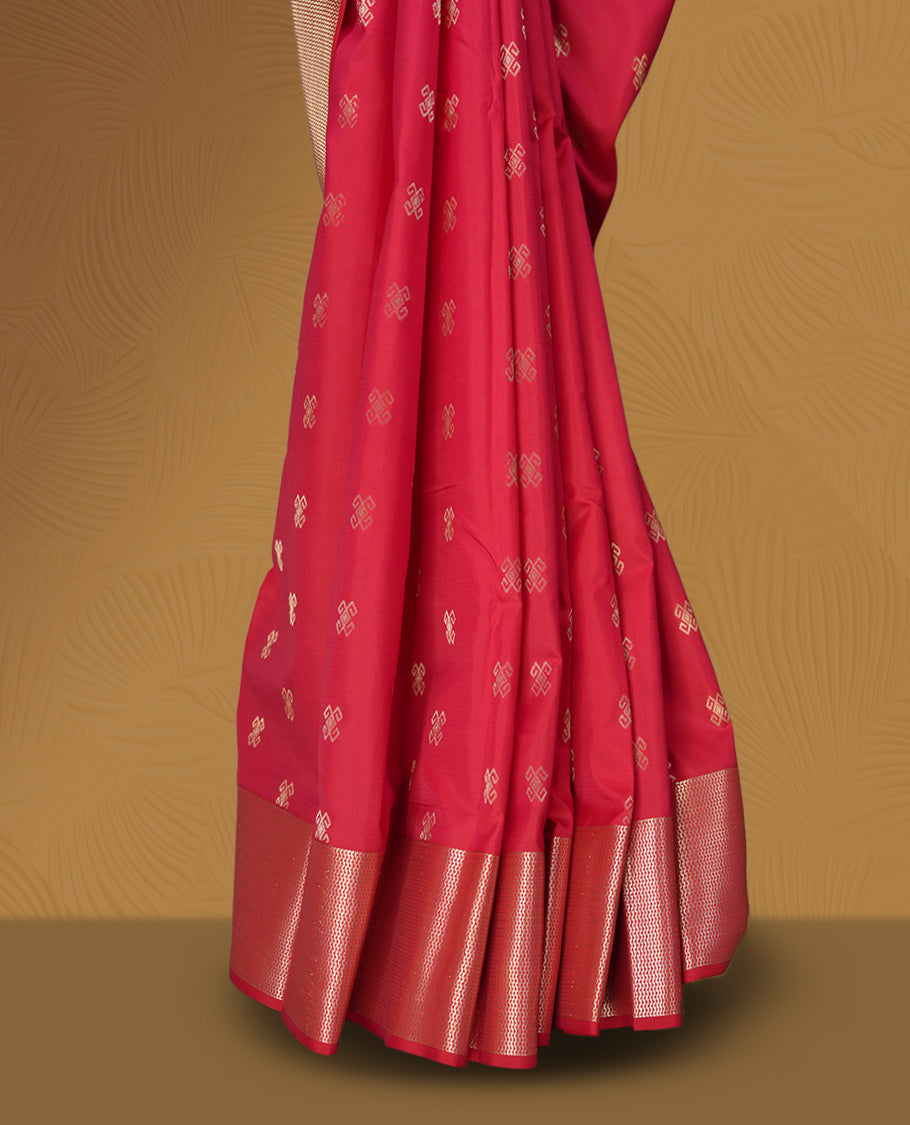 Raspberry pink colour soft silk saree featuring delicate zari buttas all over, paired with a lustrous golden zari border and pallu & Comes with a matching blouse.