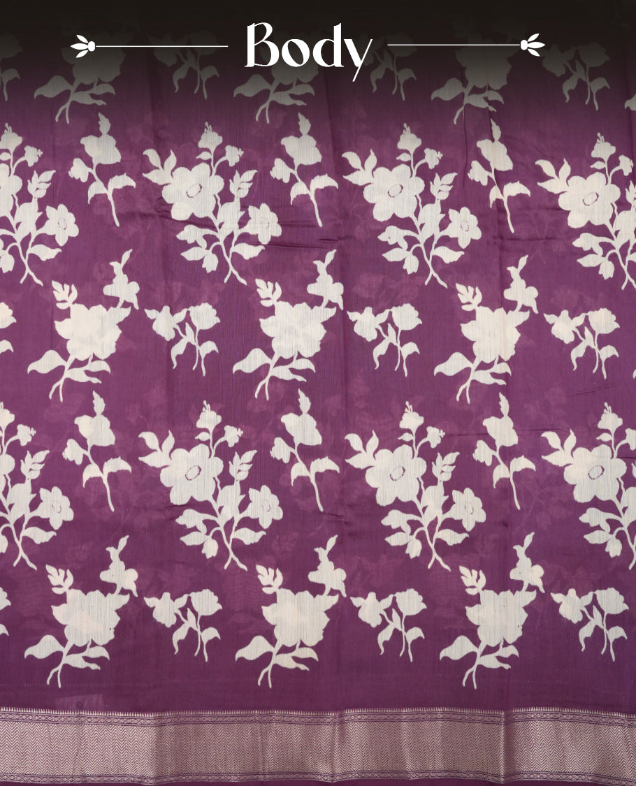 Purple colour Viscos semi printed saree featuring a light golden zari border, abstract white printed motifs on the body, and comes with a matching blouse