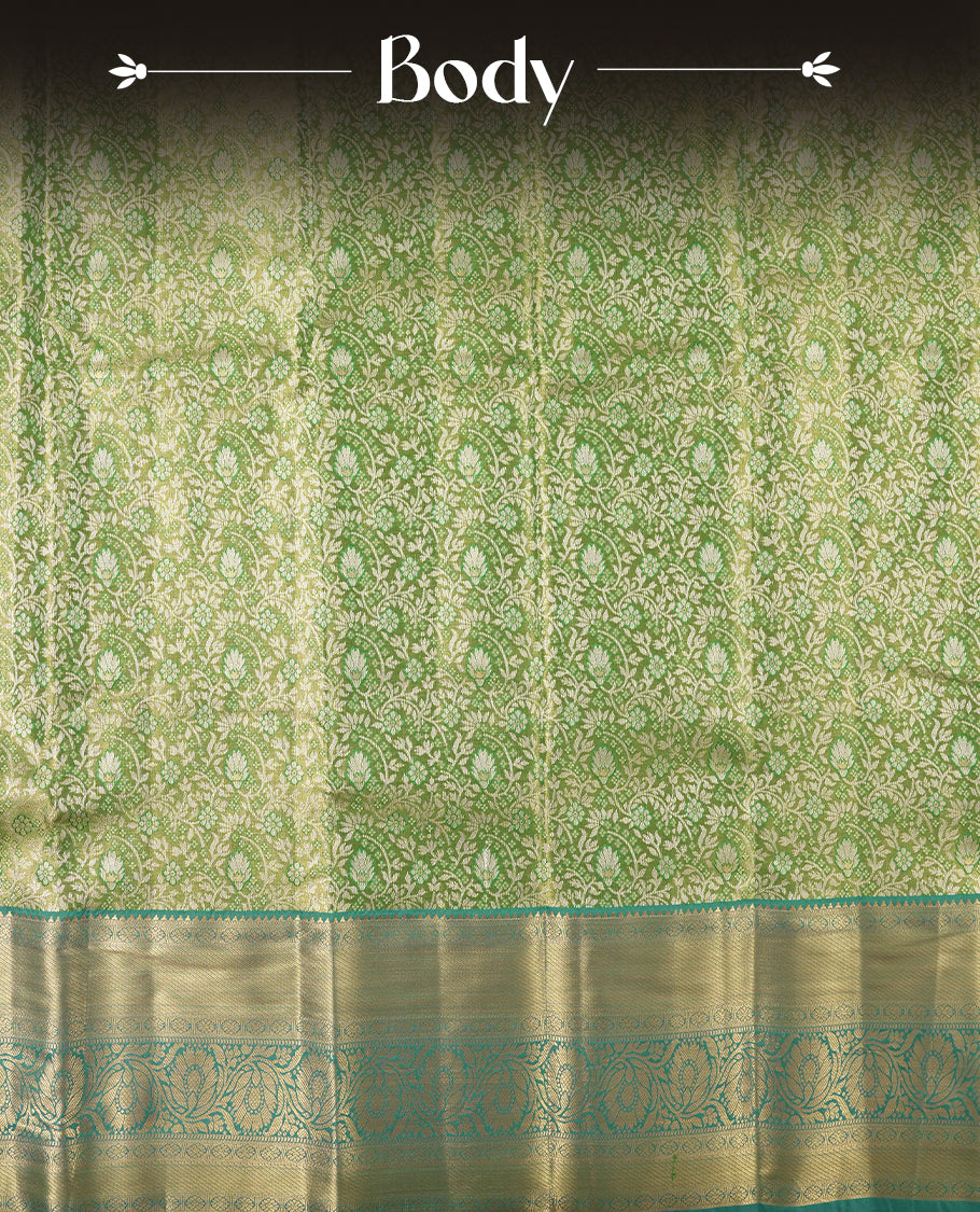Light green colour and silver Zari Tissue Brocade Saree features intricate Dimond floral Motifs on body and dark green colour contrast with traditional border & pallu, paired with matching blouse