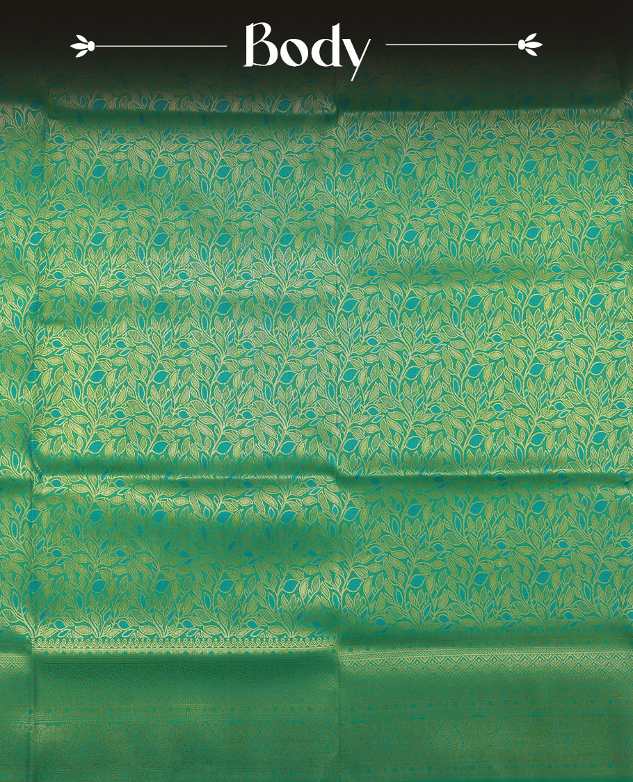 Green colour semi soft silk saree featuring an all-over woven leaf pattern in gold colour, finished with a matching border adorned with detailed paisley and floral motifs, and a matching blouse piece.
