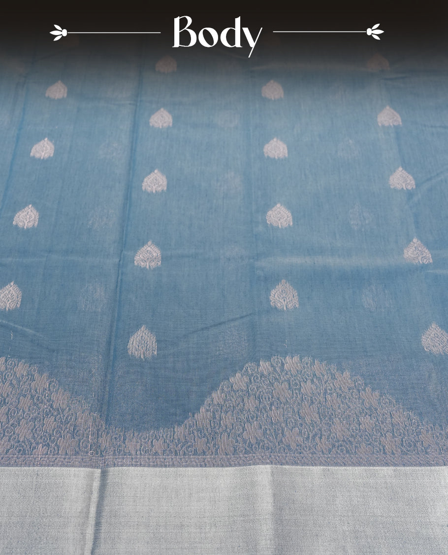 Sky Blue Silk Cotton Saree with Silver Butta Body, Accented by Silver Zari Ornamental Border on Grand Pallu, Paired with Matching Blouse Piece