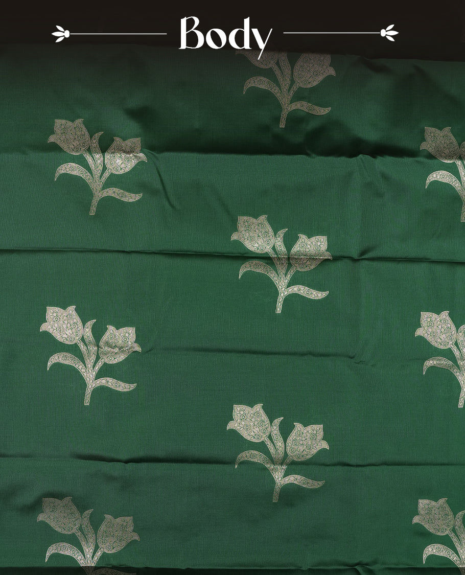 Bottle Green Semi Silk Saree with Silver Zari Floral Woven Pallu and Border, Subtle Zari Butta Motifs on the Body, Tassel Detailing, and Coordinated Blouse Piece