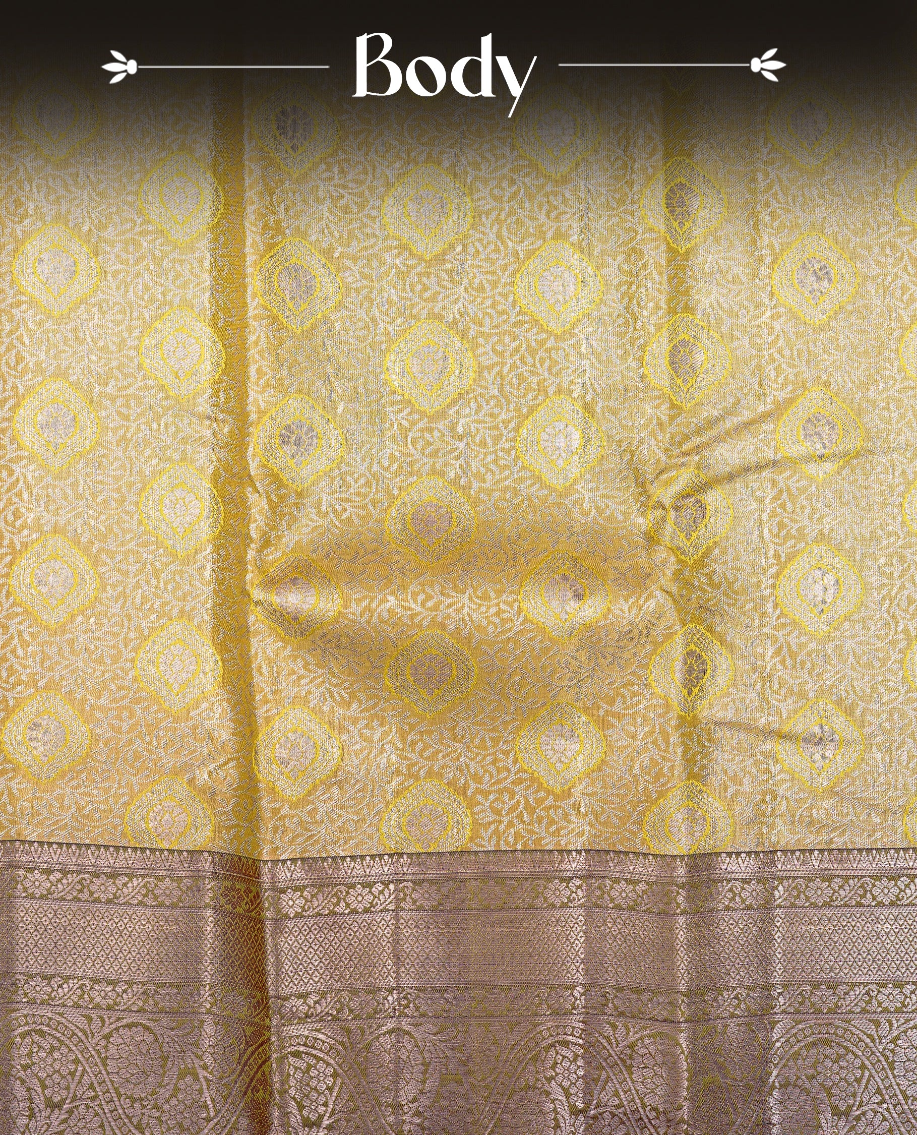 Pale yellow colour Semi tissue silk saree featuring light gold zari kodi floral motifs on body, Contrast Olive colour with traditional border, paired with matching blouse piece.