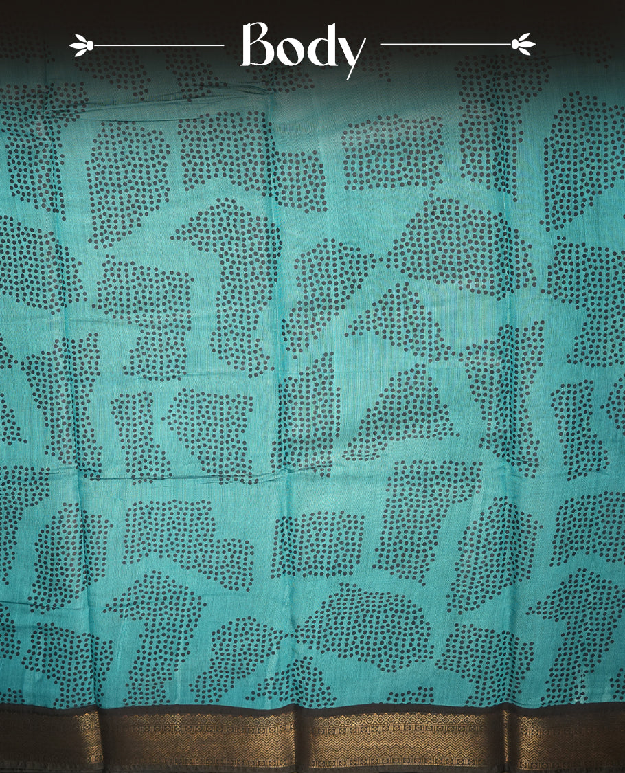 Dark teal colour mixed chanderi cotton saree with black dot motifs, multicolor striped pallu with black, off-white and turquoise triangle geometric pattern, golden zari border, and matching blouse.