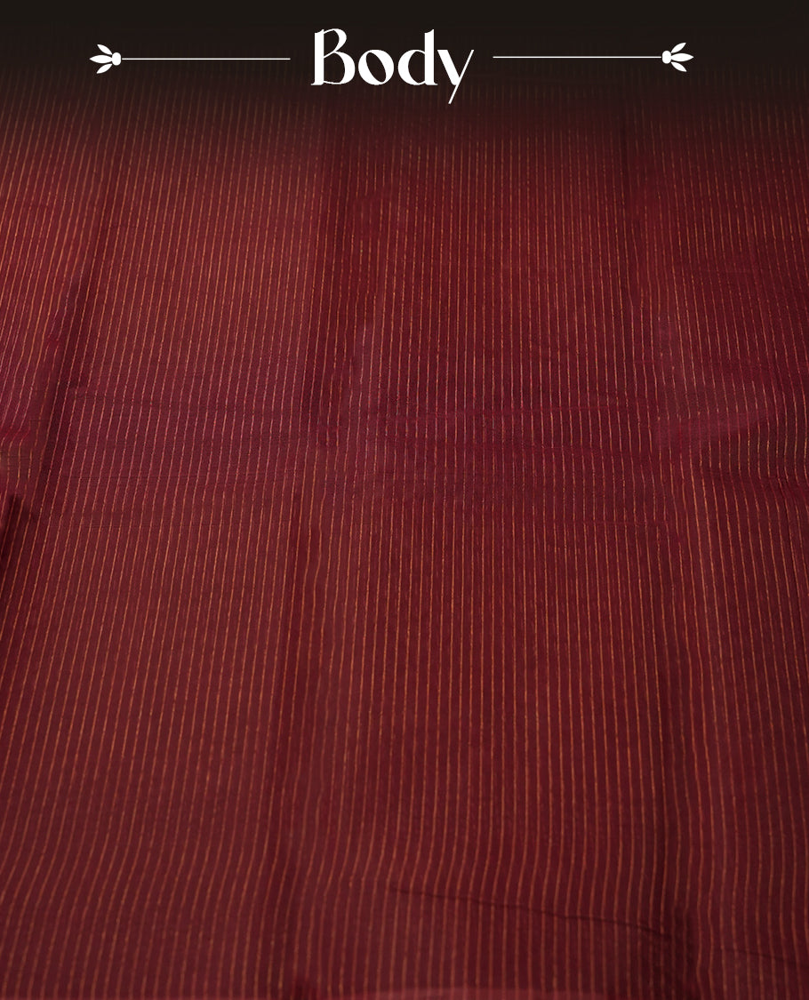 Wine red colour silk cotton saree featuring with delicate vertical copper zari lines on the body, Crafted without a border for a classy touch, Mustard colour pallu & Comes with a matching blouse for a perfectly coordinated look.