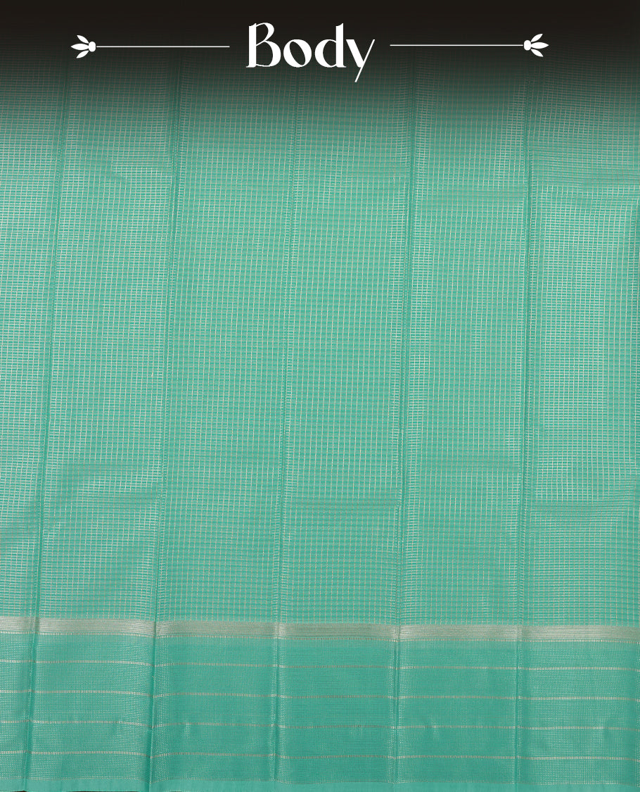 Aqua Green Colour Semi Silk Saree with Silver Checked Body, Self Coloured Silver Zari Pallu & Border, Circular Floral Motifs, and Matching Blouse Piece