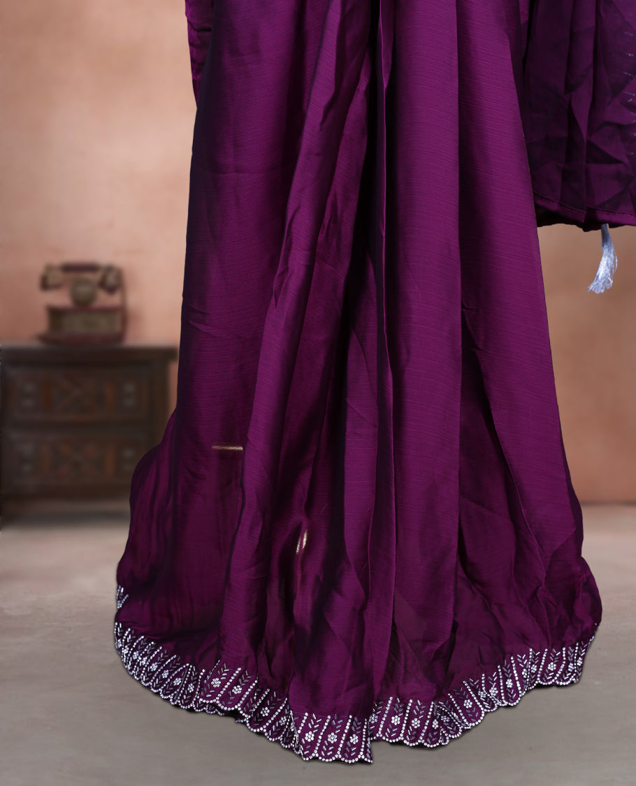 Elegant Grape colour ready to wear saree adorned with rich white stone and bead embroidery along the border and pallu, paired with a heavily embellished matching blouse for a grand festive look.