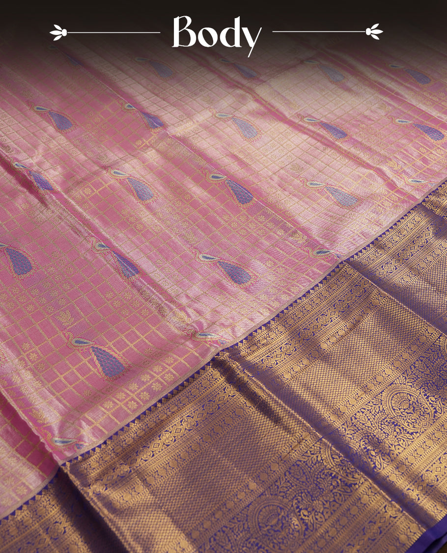Hot pink colour and Antique gold Zari Tissue Brocade Saree features intricate check and bird Motifs on body and a trypan blue colour traditional border & pallu with floral patterns, paired with matching blouse