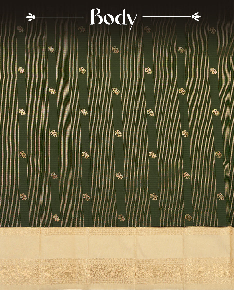 Dark green colour Semi Silk Saree with gold zari striped patterns on the body, paired with a contrasting cream colour traditional pallu and border, and a matching blouse piece.