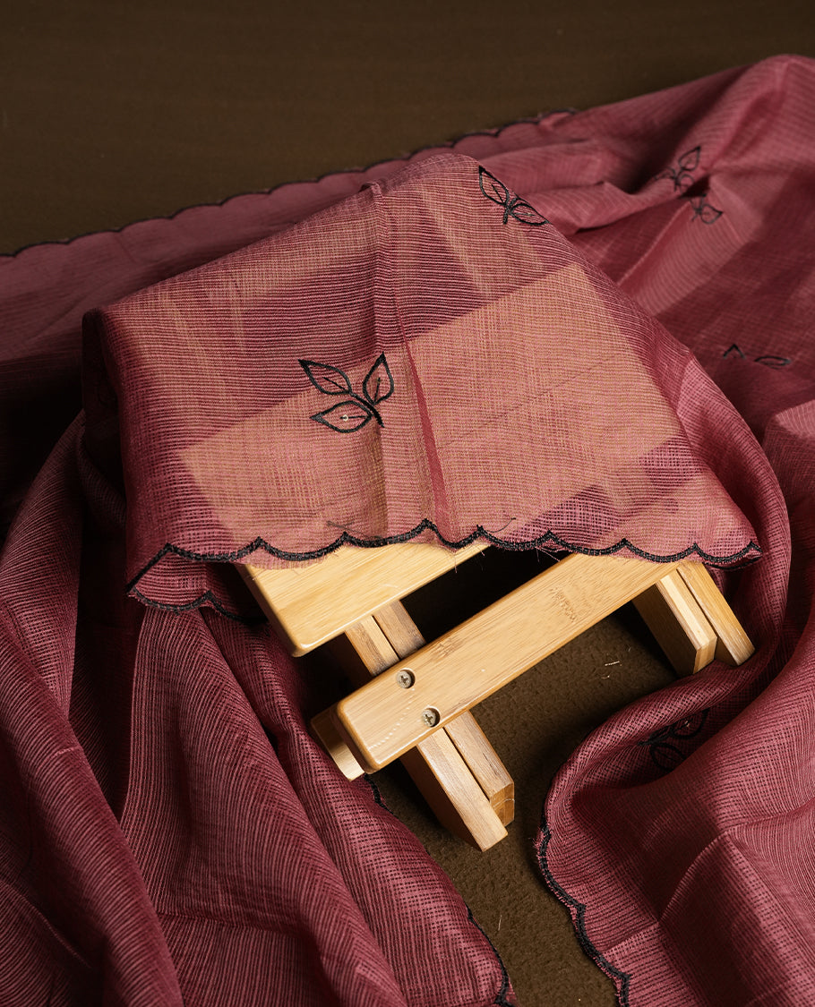 Pink colour churidhar material featuring Black colour thread embroidery on the front panel, self colour dupatta with elegant border, and matching plain bottom